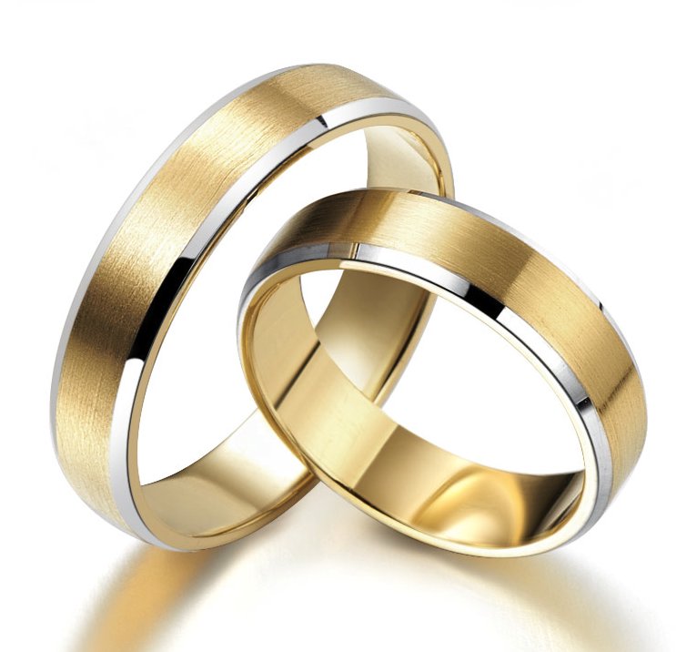 Beautiful yellow gold wedding rings with a white accent