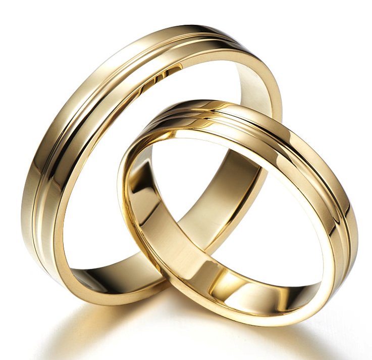 Yellow gold wedding rings decorated with stripes