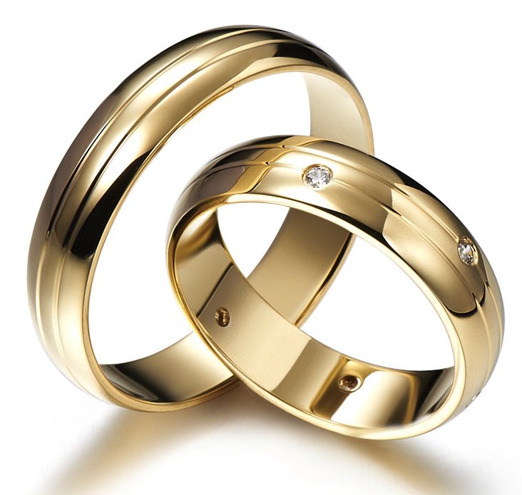 Gold wedding rings decorated with diamonds