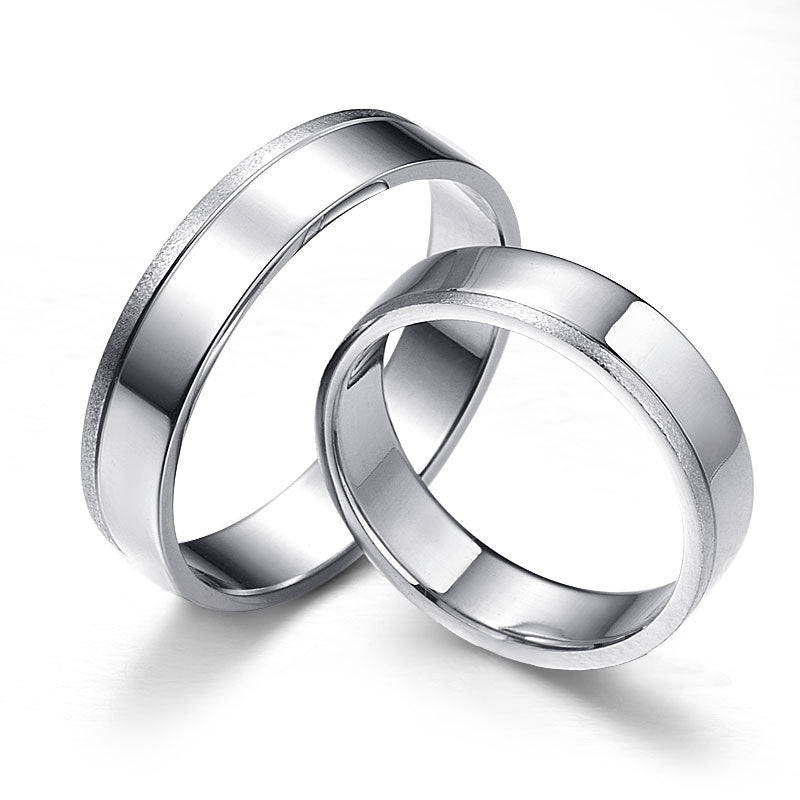 White gold wedding rings with a delicate milling and a matte edge