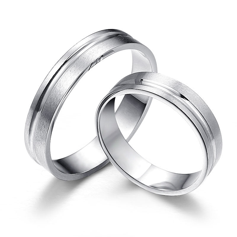 White gold wedding rings with a matte surface and delicate milling