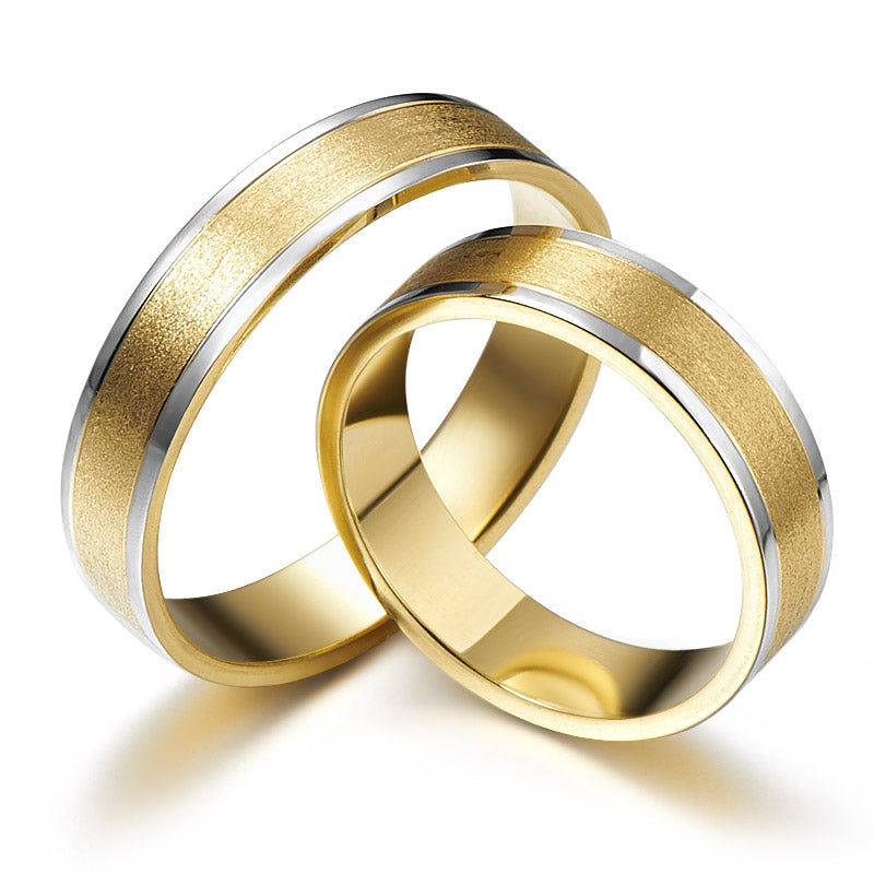 Gold wedding rings with white edges
