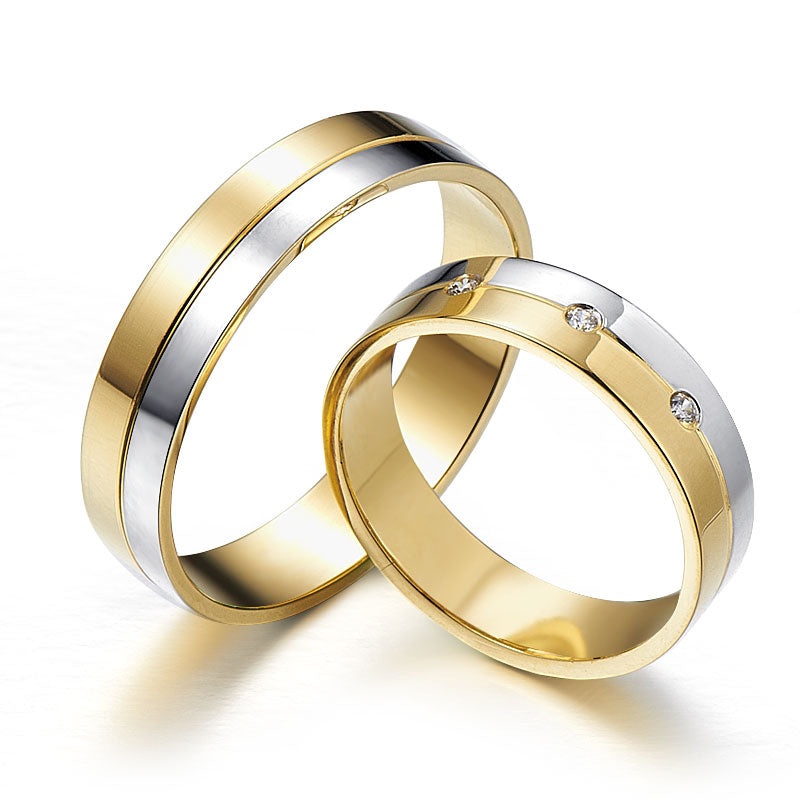 Two-tone wedding rings decorated with diamonds