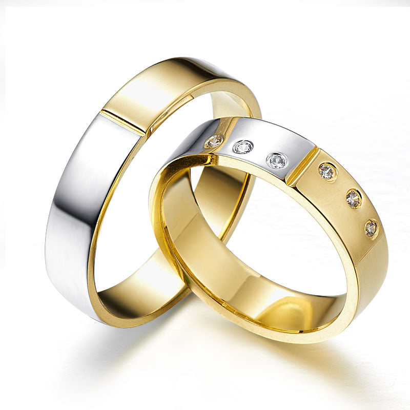 Two-tone gold wedding rings adorned with six diamonds