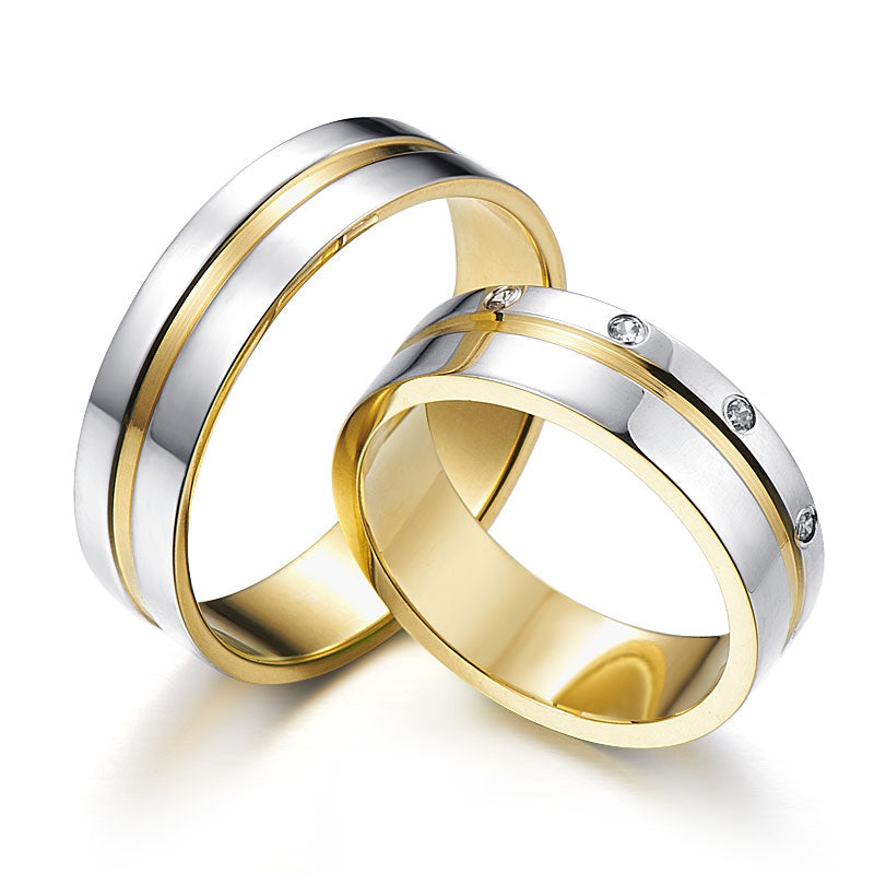 An interesting design of two-color wedding rings with diamonds