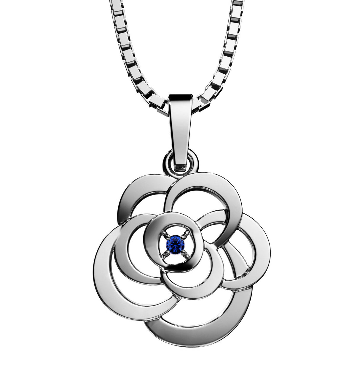 A beautiful silver pendant with a natural sapphire