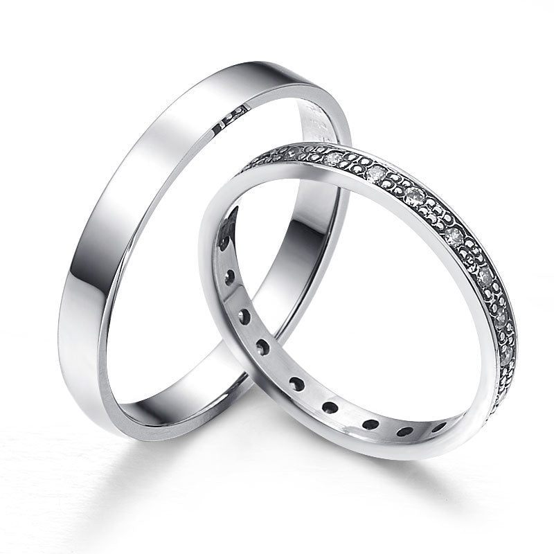 Gorgeous white gold wedding rings adorned with diamonds