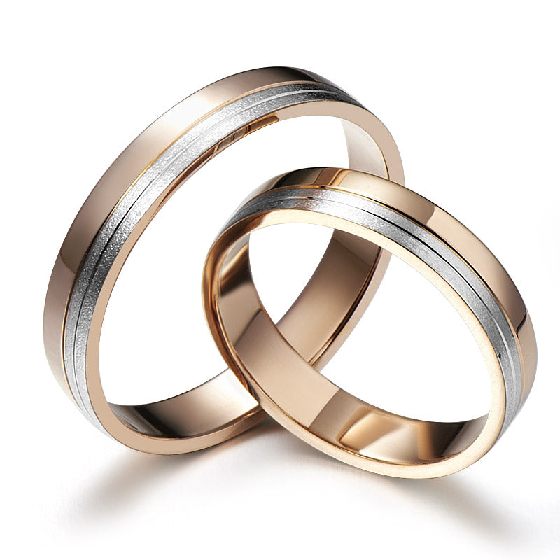 Beautiful rose gold wedding rings with a white accent