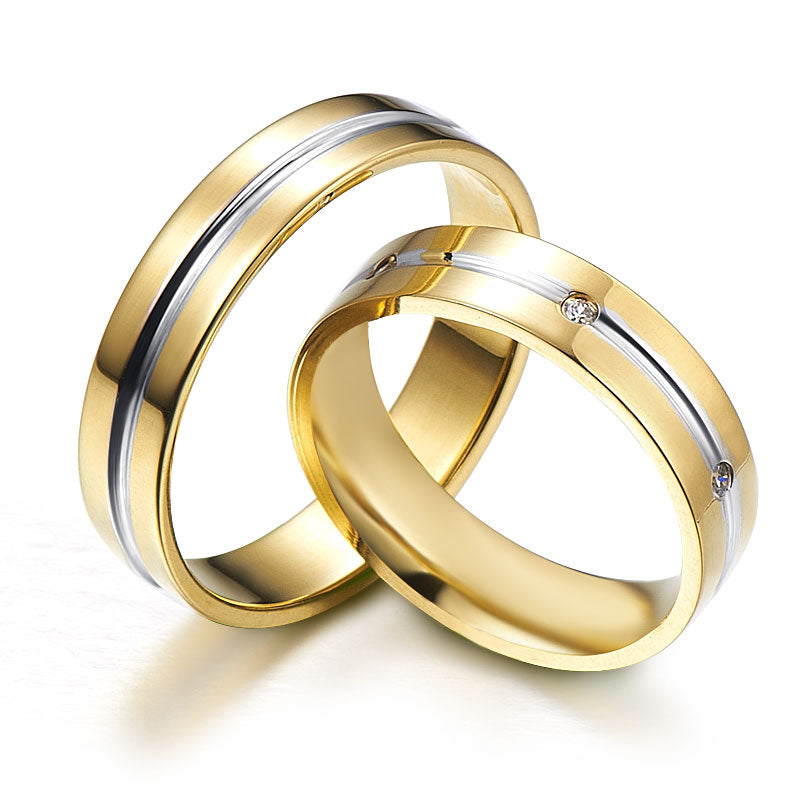 White and yellow gold wedding rings with diamonds