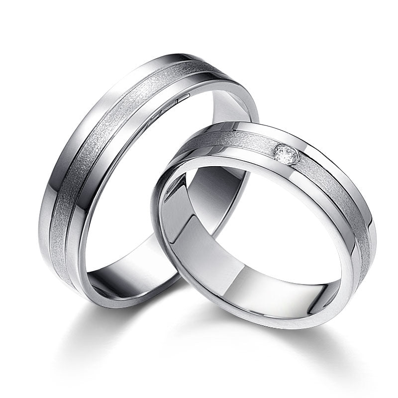 White gold wedding rings decorated with diamonds