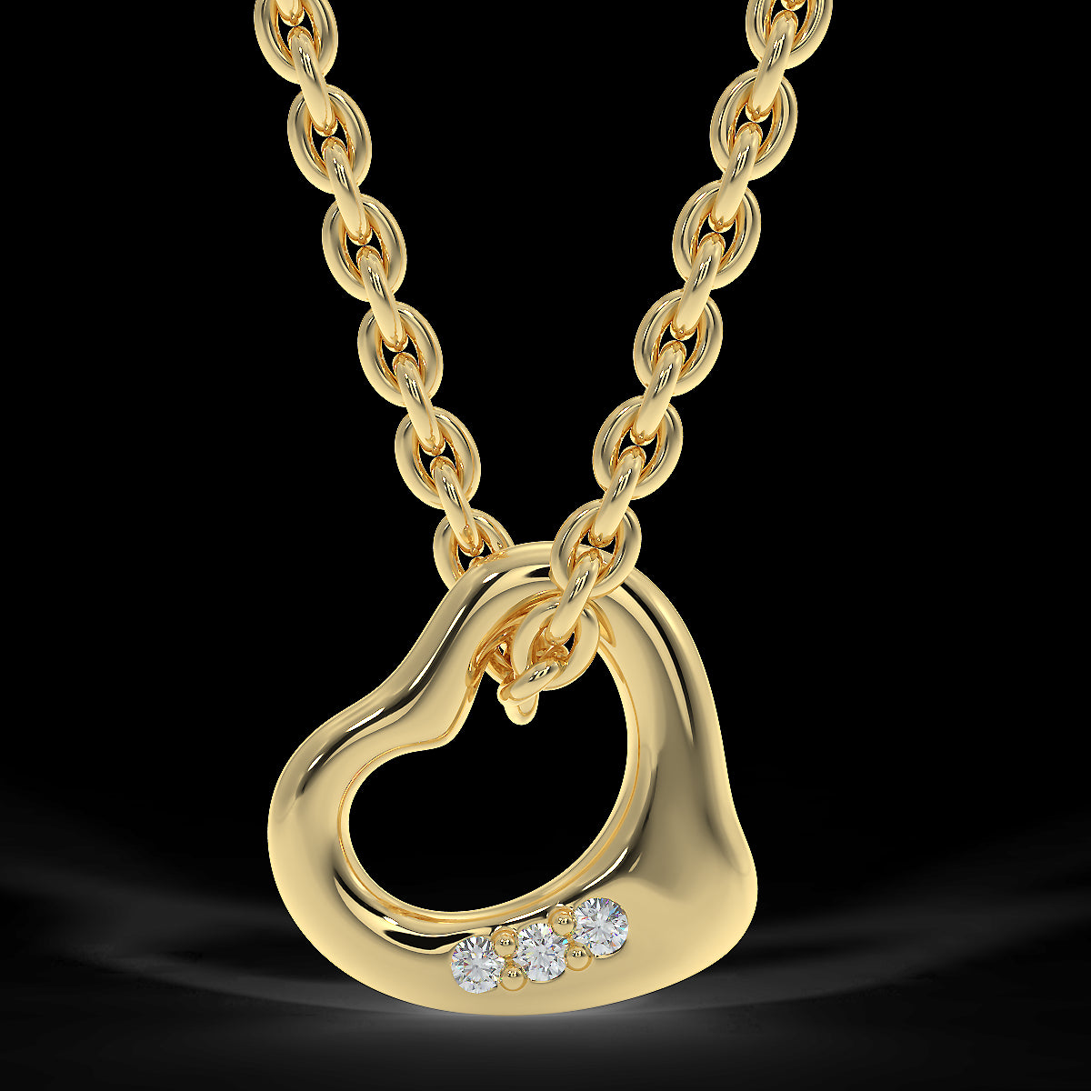 Yellow gold heart pendant with three diamonds