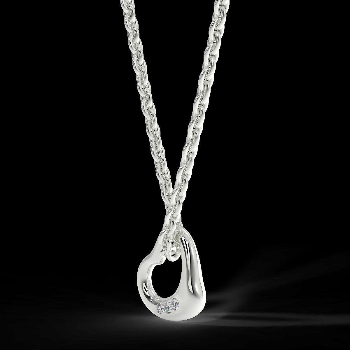 Heart pendant in white gold with diamonds