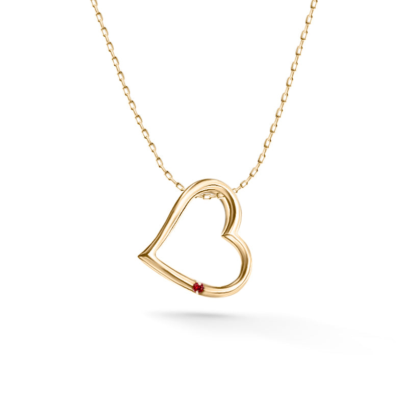 Gold heart pendant with ruby