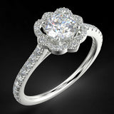 Pierścionek zaręczynowy z białego złota z diamentami o masie 0,76 ct - widok z góry pod kątem