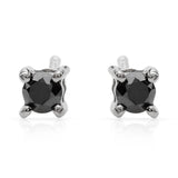 Delicate earrings with 0.40 ct black diamonds on a stud.