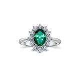 Crimson with 0.90ct emerald and diamonds