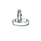 Eternity rings duo - a set of wedding rings with diamonds and sapphires