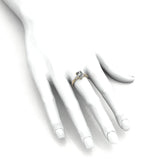 Ring with an oval-cut diamond