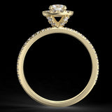Pierścionek z diamentami o masie 0,73 ct w żółtym złocie w stylu halo - widok z boku
