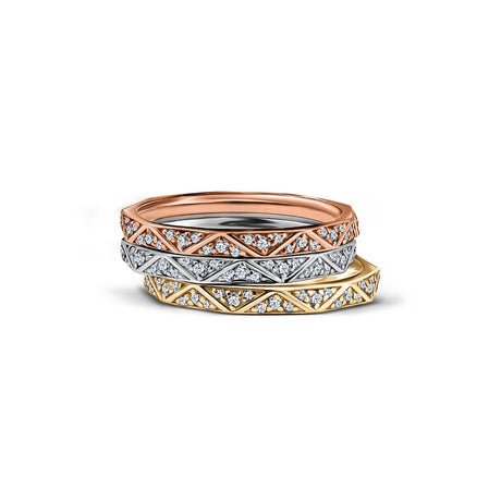 Geometric white gold wedding ring with diamonds