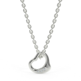 Zawieszka z białego złota z diamencikami