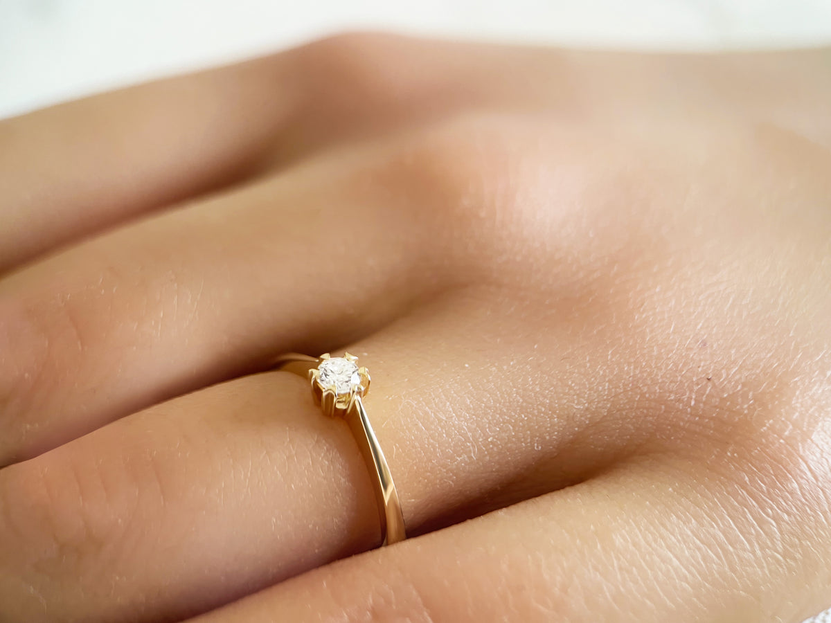Gold engagement ring with a 0.15ct diamond