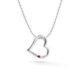 Silver heart pendant with ruby